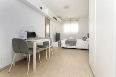 Una televisión o centro de entretenimiento en Classy VII - Ferga Suites