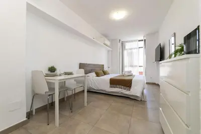 Una televisión o centro de entretenimiento en Classy XIII - Ferga Suites