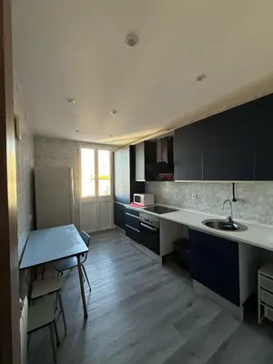 Una cocina o zona de cocina en Amplio piso para 17 en pleno centro de Madrid