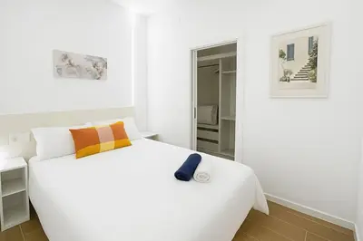 Cama o camas de una habitación en Acogedor piso climatizado cerca del Metro Oporto