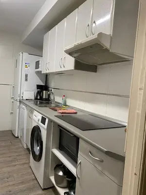 Una cocina o zona de cocina en Alojamiento Temporal Corazón Madrid