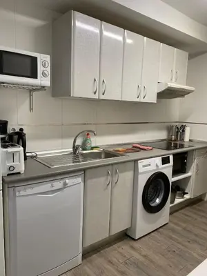 Una cocina o zona de cocina en Alojamiento Temporal Corazón Madrid