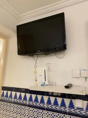 Una televisión o centro de entretenimiento en Alojamiento Temporal Corazón Madrid
