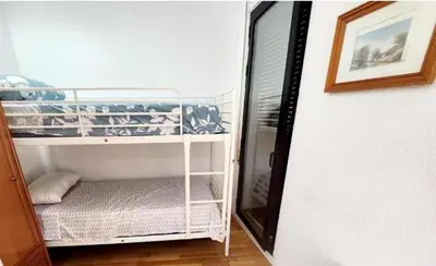 Cama o camas de una habitación en Estancia Aaron Vallecas