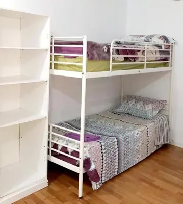 Cama o camas de una habitación en Estancia Aaron Vallecas