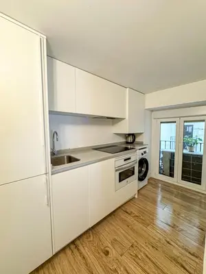 Una cocina o zona de cocina en Plaza Mayor Suites 1