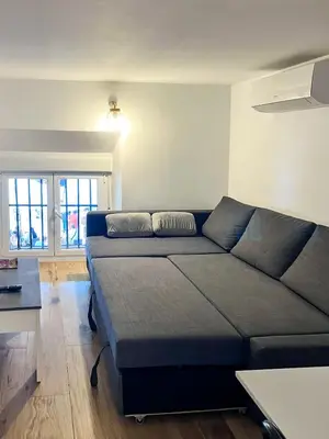 Zona de estar de Plaza Mayor Suites 1