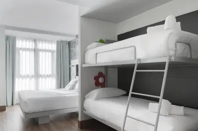 Cama o camas de una habitación en Petit Palace Plaza Mayor