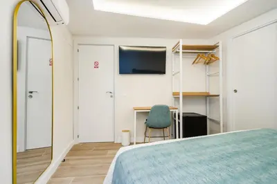 Cama o camas de una habitación en CH Las Artes de Atocha