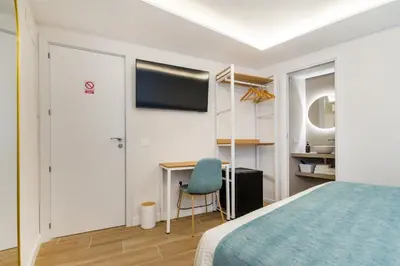 Cama o camas de una habitación en CH Las Artes de Atocha