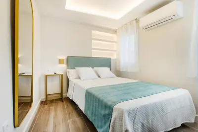 Cama o camas de una habitación en CH Las Artes de Atocha