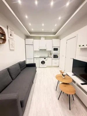 Una cocina o zona de cocina en Precioso Apartamento Moderno Recién Reformado