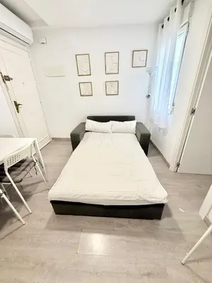 Cama o camas de una habitación en Metro Avenida de América 11 AMCH Hospedaje