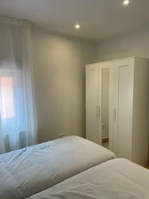Cama o camas de una habitación en Exyca Homes Gran Via