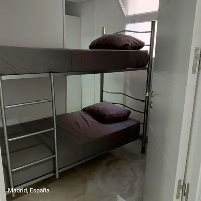 Cama o camas de una habitación en Hospedaje La Campana