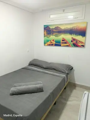 Cama o camas de una habitación en Hospedaje La Campana