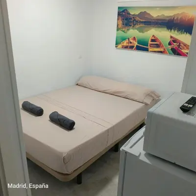 Cama o camas de una habitación en Hospedaje La Campana
