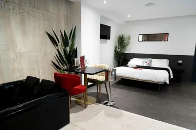 Cama o camas de una habitación en Mad Rooms
