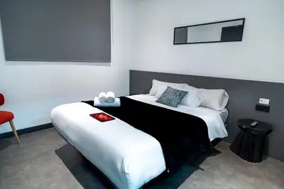 Cama o camas de una habitación en Mad Rooms