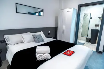 Cama o camas de una habitación en Mad Rooms