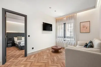 Cama o camas de una habitación en Pacifico Suites near Retiro