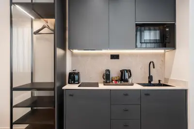 Una cocina o zona de cocina en Pacifico Suites near Retiro