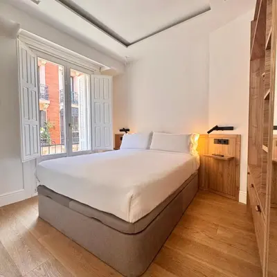 Cama o camas de una habitación en Charming Plaza Mayor Views & Top location