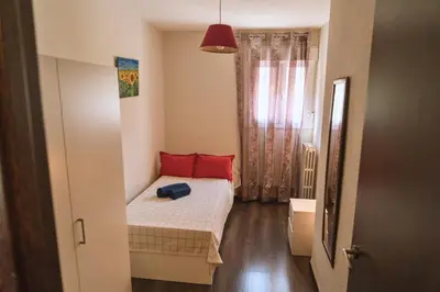 Cama o camas de una habitación en Cozy Apartment in Ventas