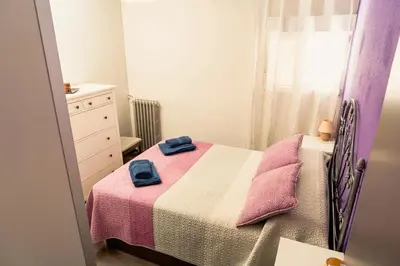 Cama o camas de una habitación en Cozy Apartment in Ventas