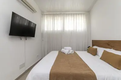 Cama o camas de una habitación en Deluxe XVI - Ferga Suites