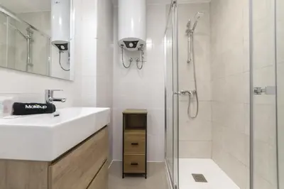 Un baño de Deluxe XVI - Ferga Suites