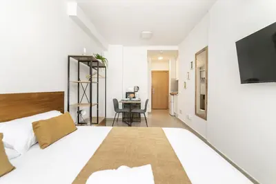 Cama o camas de una habitación en Deluxe XVI - Ferga Suites
