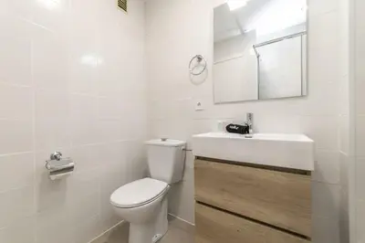 Un baño de Deluxe XVI - Ferga Suites