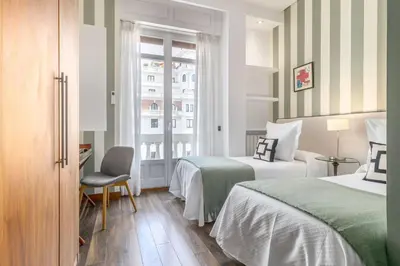Cama o camas de una habitación en Stylish 2-Bed Apartment on Gran Vía Madrid