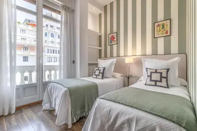 Cama o camas de una habitación en Stylish 2-Bed Apartment on Gran Vía Madrid