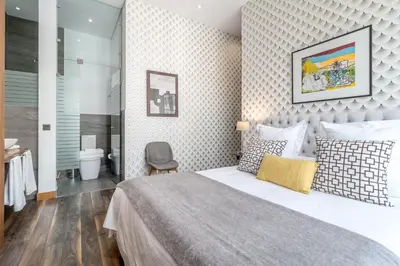 Cama o camas de una habitación en Stylish 2-Bed Apartment on Gran Vía Madrid