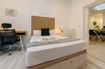 Cama o camas de una habitación en Washington habitación con comodidad y zonas compartidas Gran Vía-Madrid Temporal SBE1014