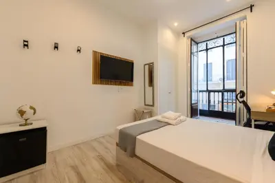 Cama o camas de una habitación en Washington habitación con comodidad y zonas compartidas Gran Vía-Madrid Temporal SBE1014