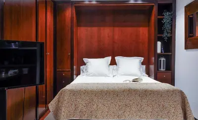 Cama o camas de una habitación en Estudio en Zona de Colon