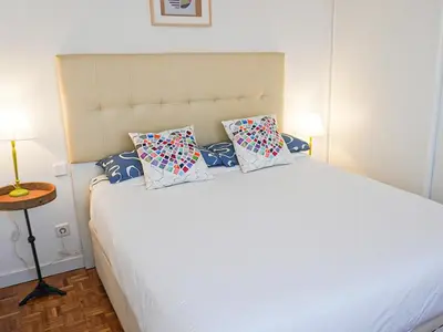 Cama o camas de una habitación en Augusto Madrid