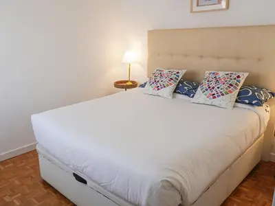 Cama o camas de una habitación en Augusto Madrid