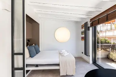 Cama o camas de una habitación en Waou Gran Via VII - Alquiler Corta Duración