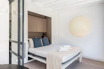 Cama o camas de una habitación en Waou Gran Via VII - Alquiler Corta Duración