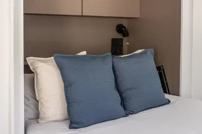 Cama o camas de una habitación en Waou Gran Via VII - Alquiler Corta Duración