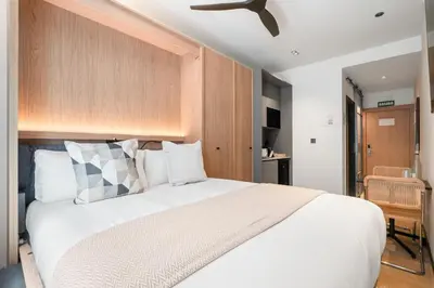 Cama o camas de una habitación en Dobo Madrid Moncayo