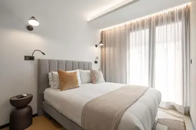 Cama o camas de una habitación en Dobo Madrid Moncayo