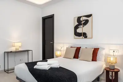 Cama o camas de una habitación en Waou Urban Home Salamanca VI