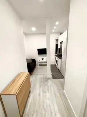 Una televisión o centro de entretenimiento en Apartament comfort