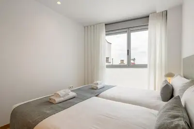 Cama o camas de una habitación en Spectacular Penthouse in Chamberí- Atico A