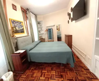 Cama o camas de una habitación en Habitaciones en Luisa